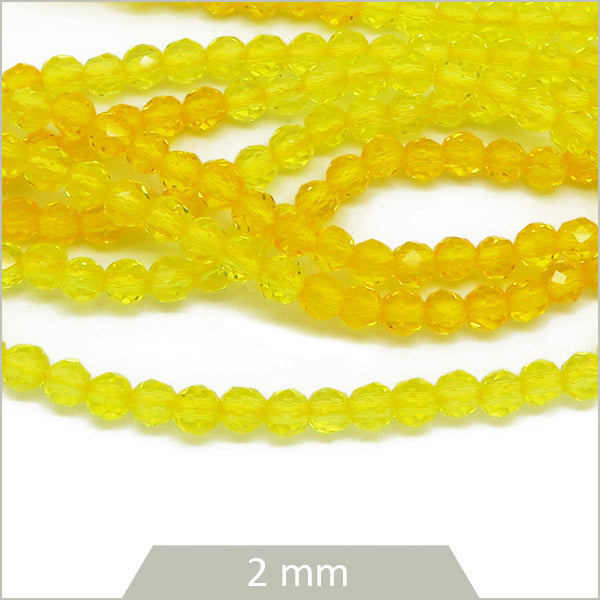 Env. 185 perles de verre à facettes 2 mm, bicolores jaune