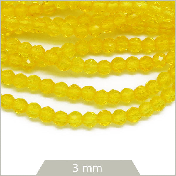 env. 145 perles de verre facettes jaune 3mm