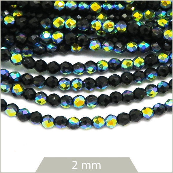 Env. 180 perles de verre à facettes noir scarabée, 2 mm