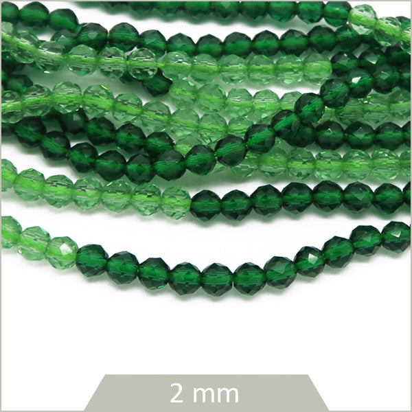 env. 187 perles de verre facettes vert bicolore 2 mm