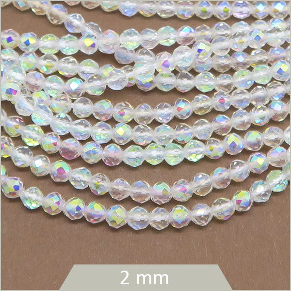 env. 180 perles de verre facettes blanc transparent irisé 2mm