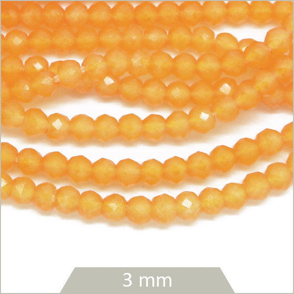 Env. 130 perles de verre à facettes orange, 3 mm
