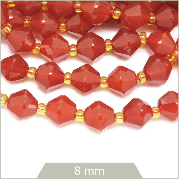 Env. 35 perles toupies en Cornaline, 8 mm