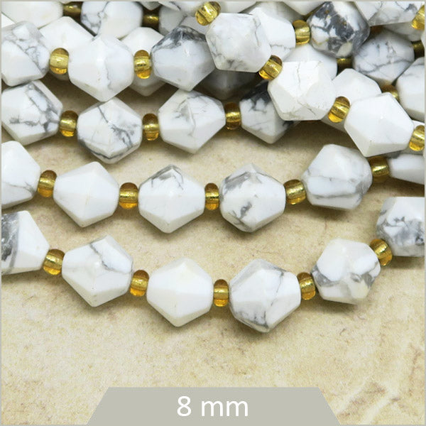 Env. 35 perles toupies en Howlite, 8 mm