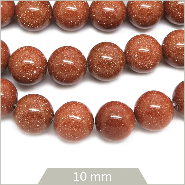 Env. 35 perles rondes en Pierre de sable doré, 10 mm