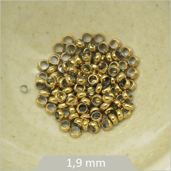 Env. 100 perles à écraser en acier inoxydable doré 1,9 mm