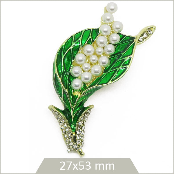 1 broche muguet alliage doré, émail coloré et perles nacrées