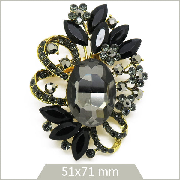 1 grande broche ovale royale alliage doré, cristaux noirs et argent