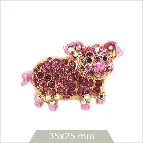 1 broche cochon alliage doré, email et strass roses