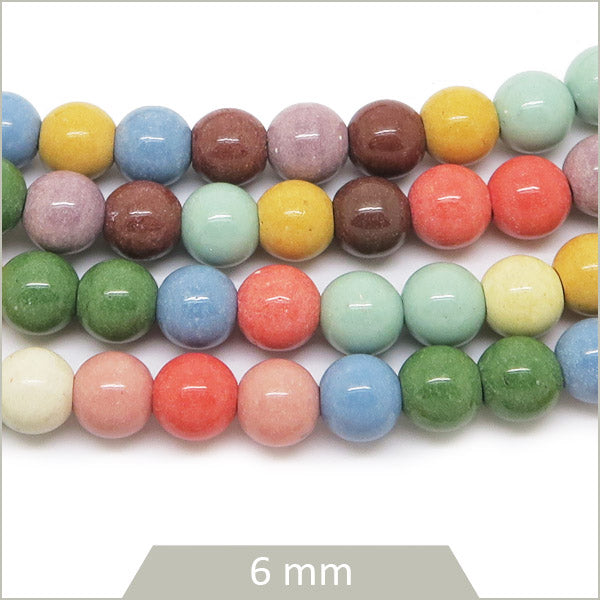Env. 60 perles rondes céramique multicolore, 6 mm