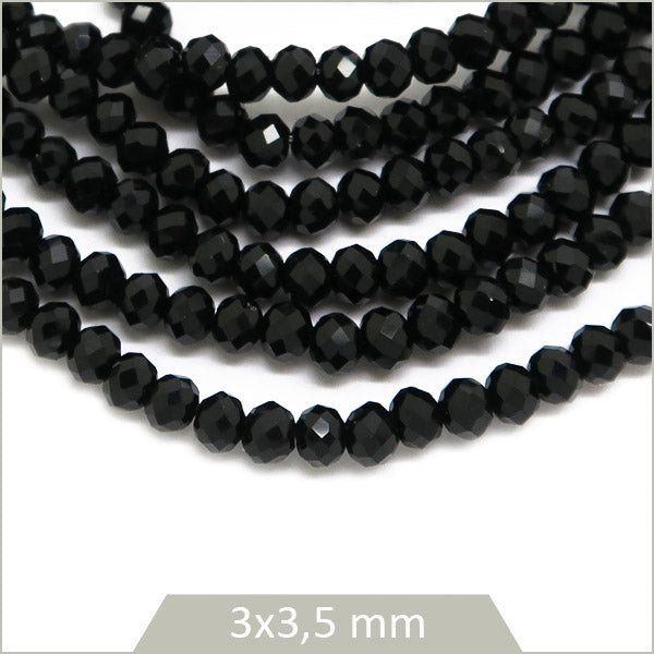Env. 100 perles de verre donut noires 3x3,5 mm