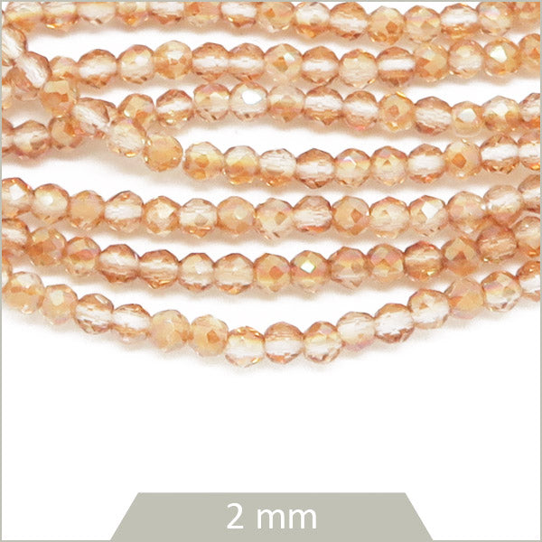 Env. 220 perles de verre à facettes rose orangé, 2 mm