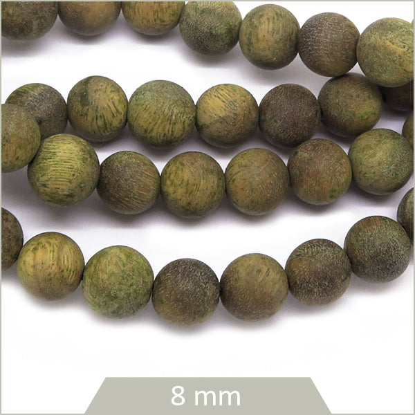 Env. 50 perles rondes en bois de santal, 8 mm