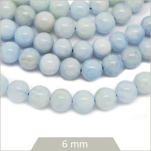 Env. 60 perles rondes en Aigue-Marine rare 6 mm