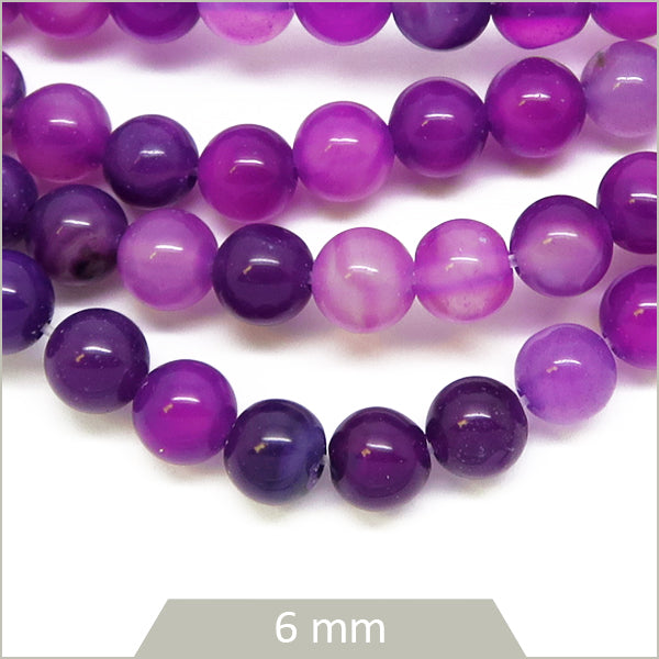 Env. 60 perles rondes en Agate rayée violette, 6 mm