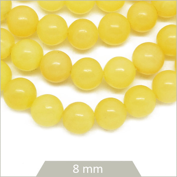 Env. 45 perles rondes en Calcite miel 8 mm