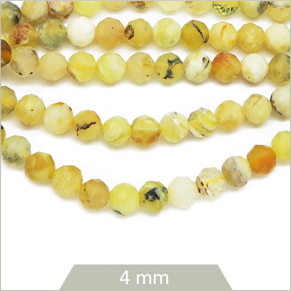 Env. 140 perles facettées en Opale jaune, 4 mm