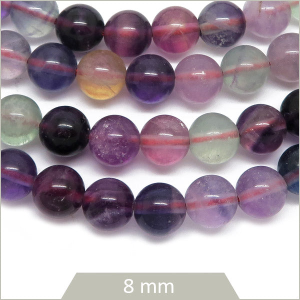 Env. 49 perles rondes en Fluorite arc-en-ciel 8 mm