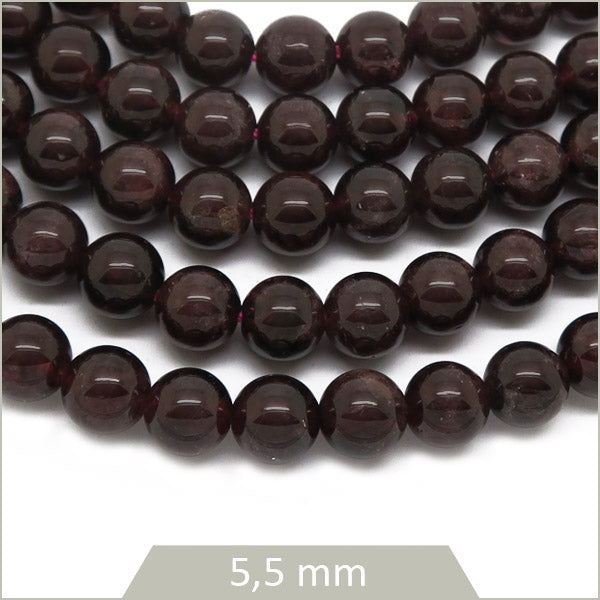 Env. 70 perles rondes en Grenat 5,5 mm