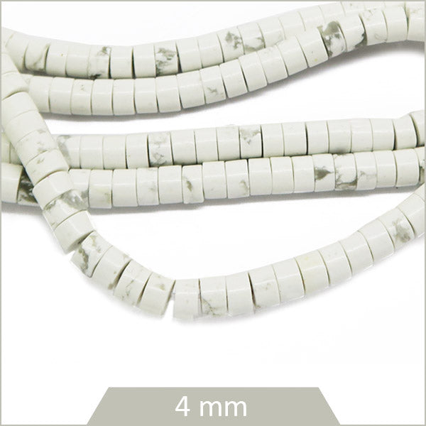 Env. 140 perles rondelles heishi en Howlite