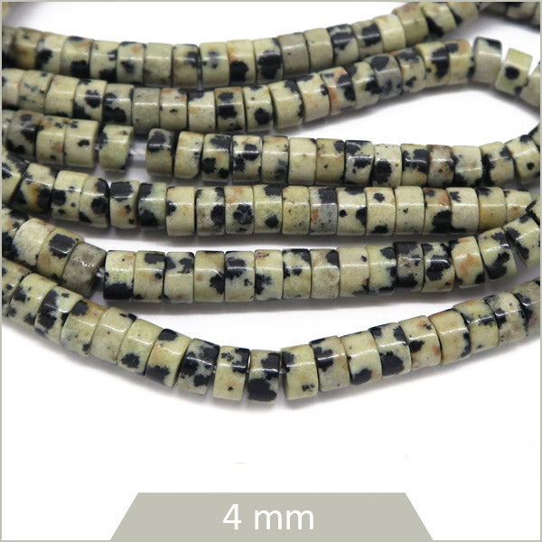 Env. 160 perles heishi en jaspe dalmatien