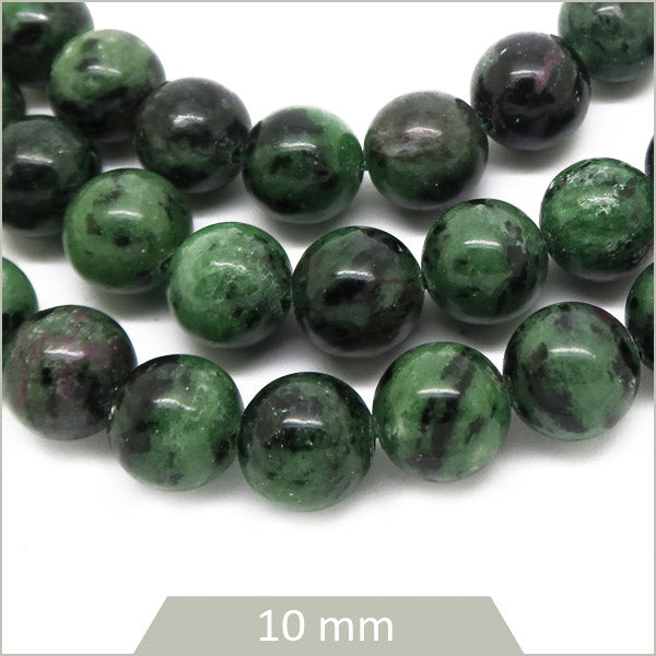 Env. 39 perles rondes en zoïsite, 10 mm
