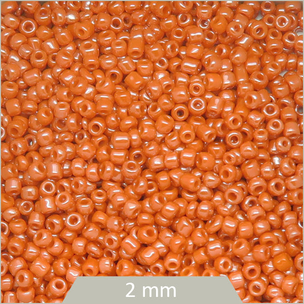 40g de perles rocailles orange irisé 2 mm