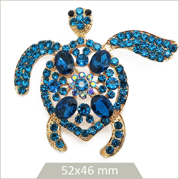 1 grande broche tortue marine "Denim blue" alliage doré, cristaux bleu