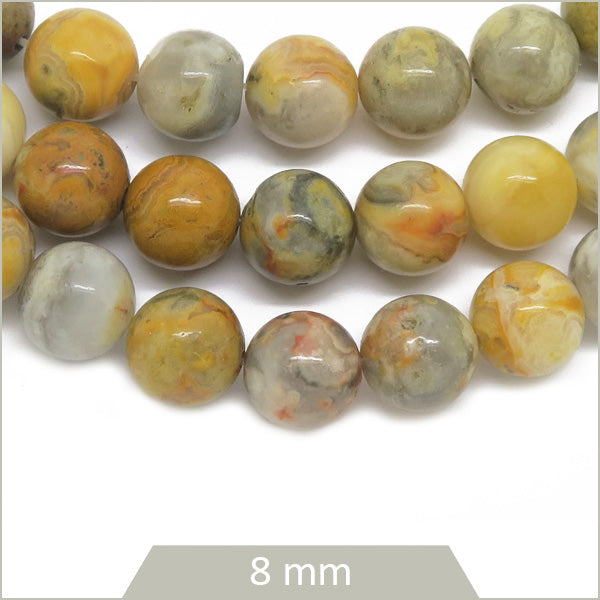 Env. 45 perles rondes en Agate Crazy jaune 8 mm