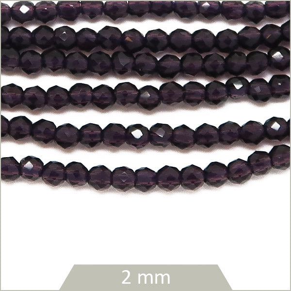 Env. 180 perles de verre rondes à facettes violet foncé, 2 mm