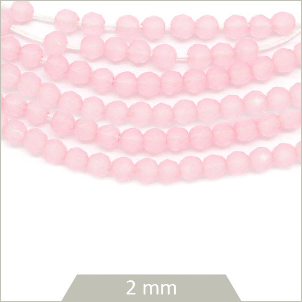 Env. 180 perles de verre rondes à facettes rose, 2 mm