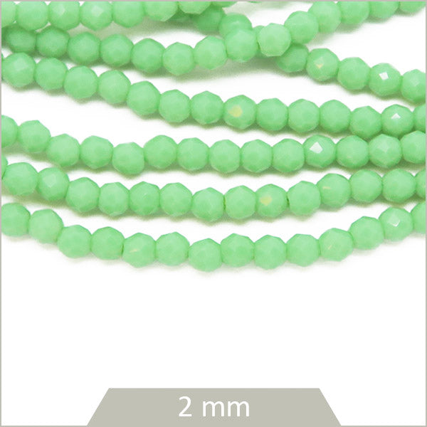 Env. 180 perles de verre rondes à facettes vert d'eau opaque, 2 mm