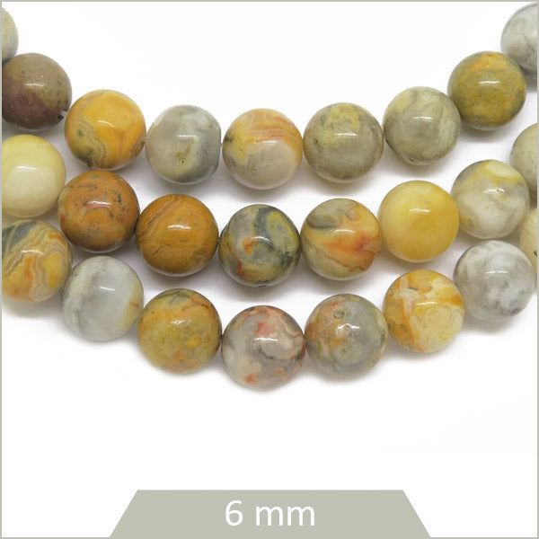 Env. 60 perles rondes en Agate Crazy jaune 6 mm