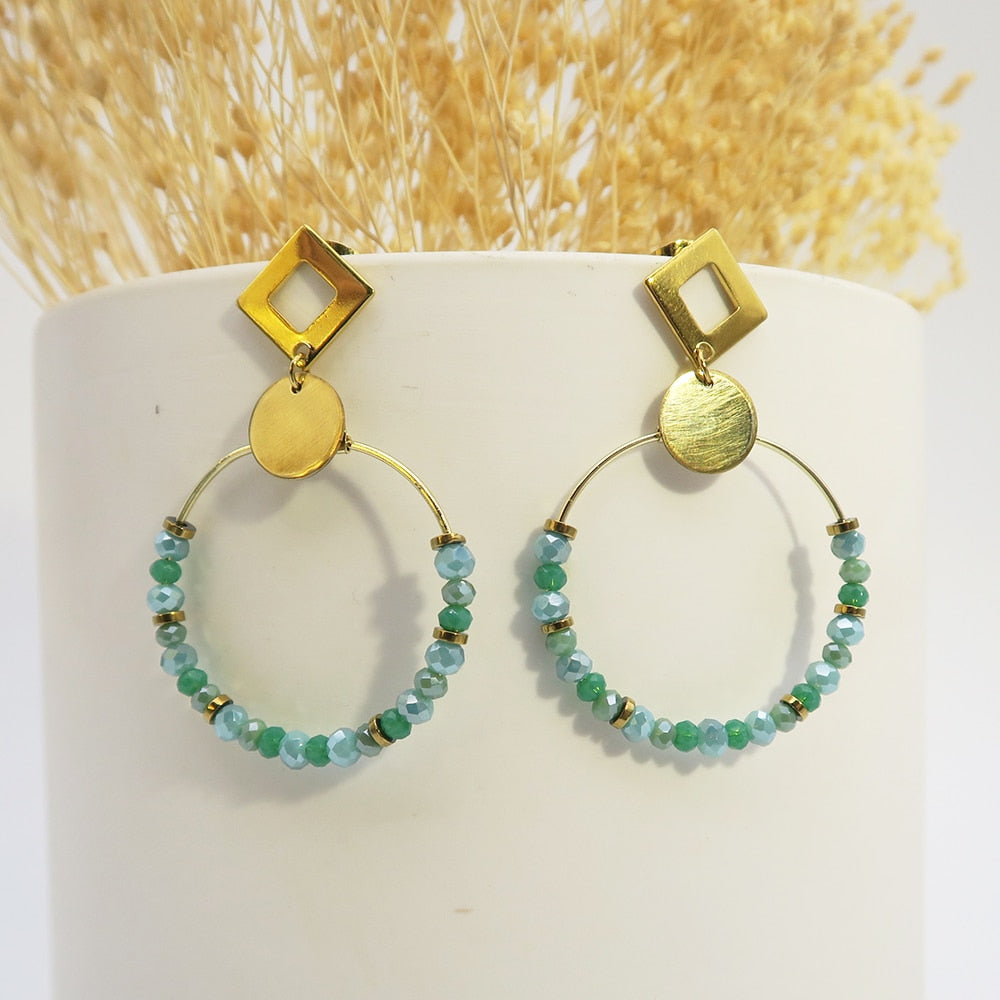 4 clous de boucles d'oreilles losange ajouré en acier doré