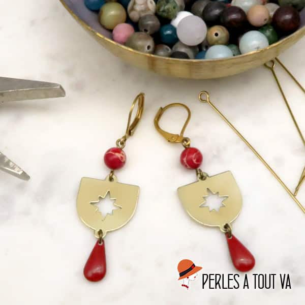 Idée boucles d'oreilles écusson