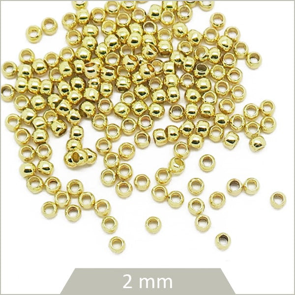 perles à écraser dorées