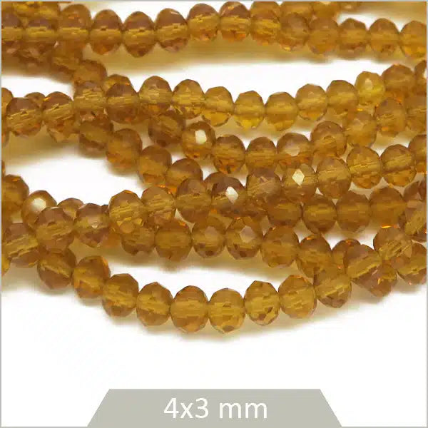 Grossiste perles donut en verre miel transparent