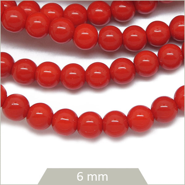 Env. 65 perles de verre rouge vif 6 mm