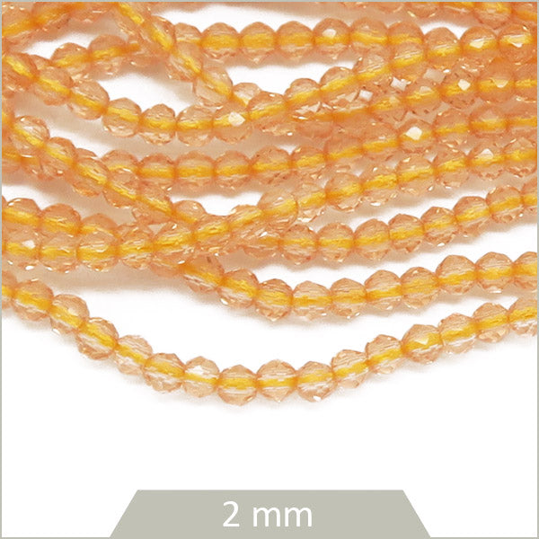 env. 182 perles de verre facettes champagne 2mm