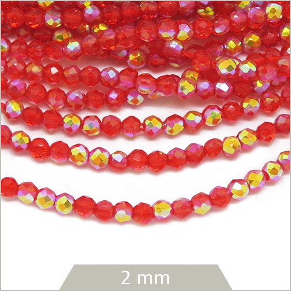 Env. 180 perles de verre à facettes rouge irisé, 2 mm