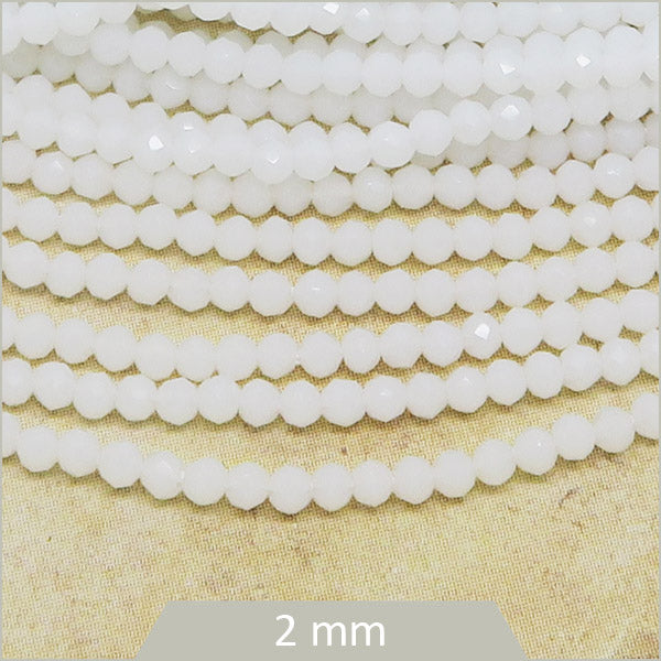 Env. 180 perles de verre à facettes blanc opaque, 2 mm