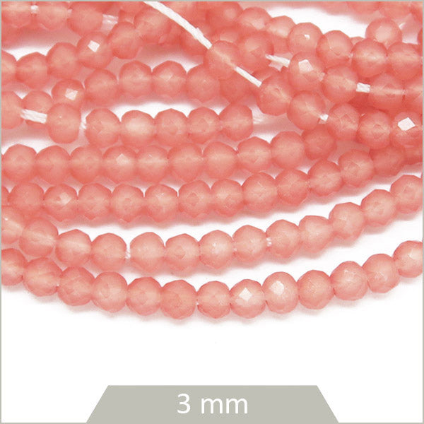 Env. 130 perles de verre à facettes corail, 3 mm