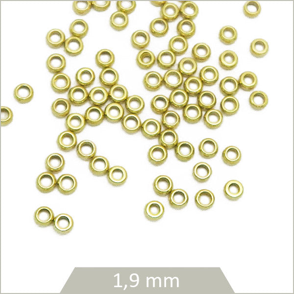 Env. 100 perles à écraser en acier inoxydable doré 1,9 mm