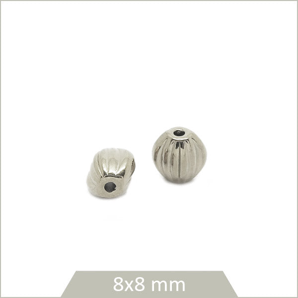 2 perles ethniques ovales en acier inoxydable