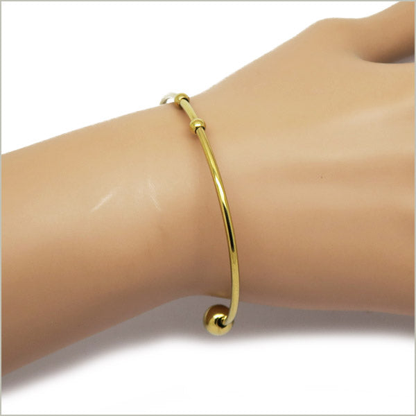 1 bracelet jonc torque ouvert pour charms en acier doré, largeur 2 mm