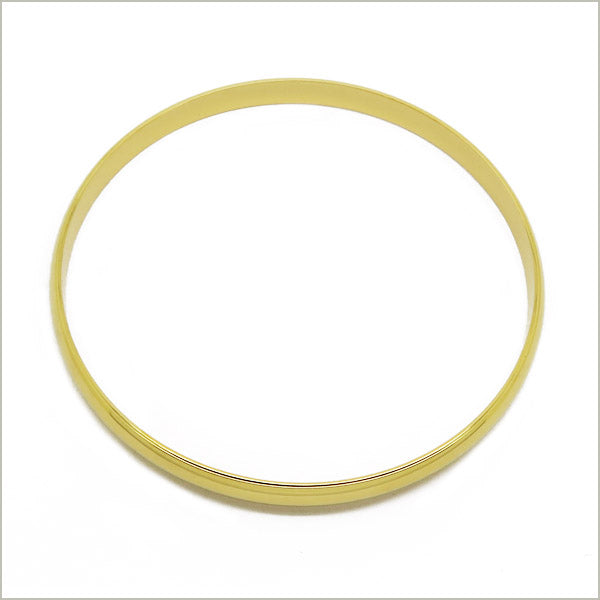 1 bracelet jonc en acier doré, largeur 5 mm