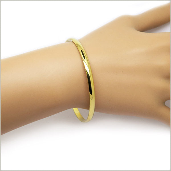 Bracelet uni en acier doré