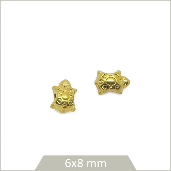 2 petites perles tortues ethniques en acier inoxydable doré