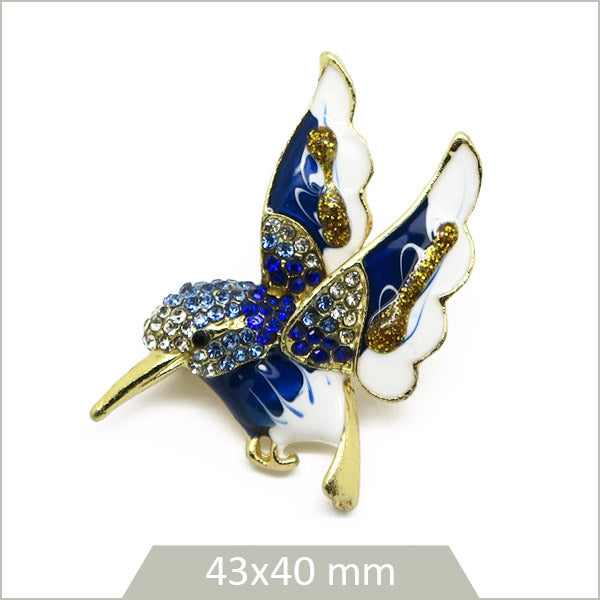 1 broche colibri alliage doré, émail bleu & blanc et strass