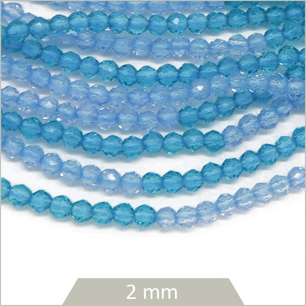 Env. 220 perles de verre à facettes 2 mm, bicolores bleu